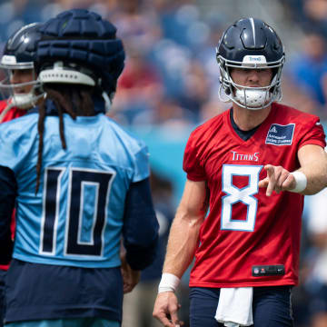 Tennessee Titans quarterback Will Levis talks with his receivers during warmups at Nissan Stadium in Nashville, Tenn., Saturday, July 27, 2024. The Titans hosted Back Together Weekend to allow fans to get a look at the retooled team.