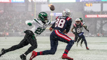 Jan 7, 2024; Foxborough, Massachusetts, USA; New York Jets safety Tony Adams (22) defends against New England Patriots tight end Mike Gesicki (88) in the first half at Gillette Stadium.