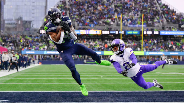 Seattle Seahawks wide receiver DK Metcalf (14) catches a pass for a touchdown.