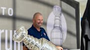 Panthers General Manager Bill Zito places the Stanley Cup on a table on Wednesday August 14, 2024 at Fiserv Forum in Milwaukee, Wis.