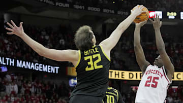 Oregon center Nate Bittle (32) blocks a shot by Wisconsin guard John Blackwell (25) during overtime of their game Saturday, February 22, 2025 at the Kohl Center in Madison, Wisconsin. Oregon beat Wisconsin 77-73 in overtime.

Mark Hoffman/Milwaukee Journal Sentinel