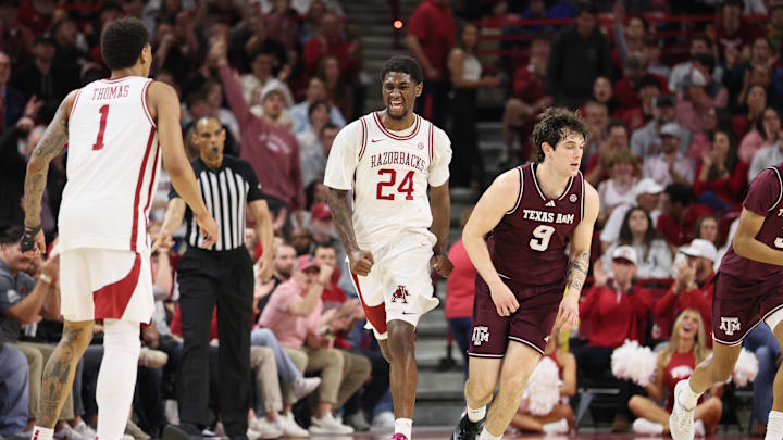 Feb 25, 2026; Fayetteville, Arkansas, USA; Arkansas Razorbacks wing Billy Richmond III (24) celebrates after scoring against the Texas A&M Aggies during the first half at Bud Walton Arena. Mandatory Credit: Nelson Chenault-Imagn Images