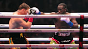 Canelo Alvarez and Terence Crawford box during their super middleweight title bout at Allegiant Stadium 