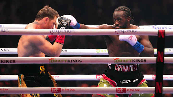 Canelo Alvarez and Terence Crawford box during their super middleweight title bout at Allegiant Stadium 