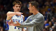 Nov 11, 2022; Durham, North Carolina, USA;  Duke Blue Devils head coach Jon Scheyer (right) instructs guard Jaden Schutt during the second half at Cameron Indoor Stadium. Mandatory Credit: Rob Kinnan-Imagn Images