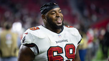 Dec 25, 2022; Glendale, Arizona, USA; Tampa Bay Buccaneers guard Shaq Mason (69) against the Arizona Cardinals at State Farm Stadium. Mandatory Credit: Mark J. Rebilas-Imagn Images