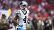 Nov 16, 2025; Atlanta, Georgia, USA; Carolina Panthers wide receiver Tetairoa McMillan (4) looks on during the second quarter against the Atlanta Falcons at Mercedes-Benz Stadium. Mandatory Credit: Brett Davis-Imagn Images