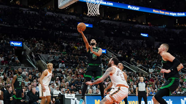 Dec 31, 2023; San Antonio, Texas, USA;  Boston Celtics guard Derrick White (9) shoots over the San Antonio Spurs.