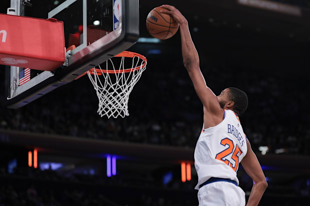 Knicks guard/forward Mikal Bridges (25) goes up for a dunk during the second half against the Charlotte Hornets