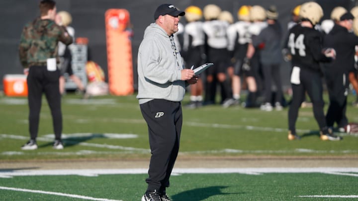 Purdue Boilermakers head coach Barry Odom looks down field 