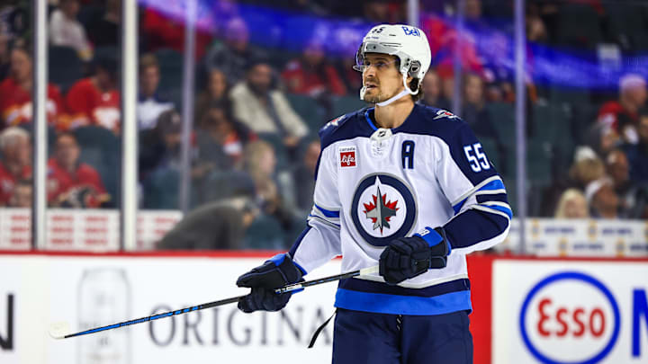 Oct 4, 2024; Calgary, Alberta, CAN; Winnipeg Jets center Mark Scheifele (55) during the first period against the Calgary Flames at Scotiabank Saddledome. Mandatory Credit: Sergei Belski-Imagn Images