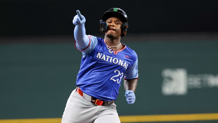 Jul 13, 2024; Arlington, TX, USA;  National League Future infielder Cam Collier (23) reacts after hitting a home run during the third inning against the National League Future team during the Major league All-Star Futures game at Globe Life Field.  Mandatory Credit: Kevin Jairaj-USA TODAY Sports