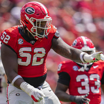 Sep 9, 2023; Athens, Georgia, USA; Georgia Bulldogs defensive lineman Christen Miller (52) reacts after making a tackle against the Ball State Cardinals during the second half at Sanford Stadium. Mandatory Credit: Dale Zanine-Imagn Images