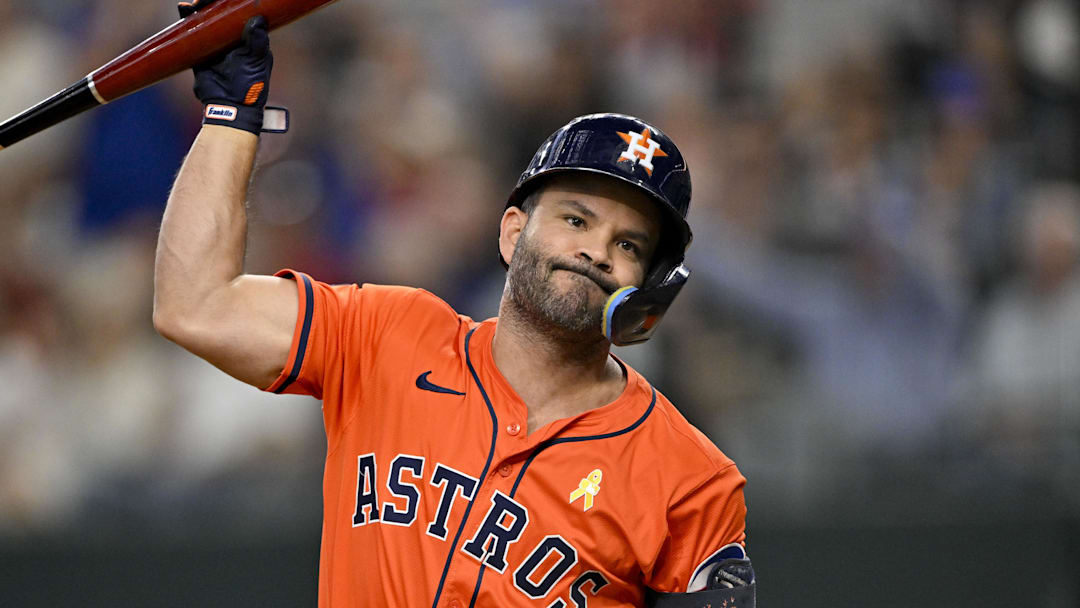 Sep 7, 2025; Arlington, Texas, USA; Houston Astros designated hitter Jose Altuve (27) throws his bat after he strikes out against the Texas Rangers during the eighth inning at Globe Life Field. Mandatory Credit: Jerome Miron-Imagn Images