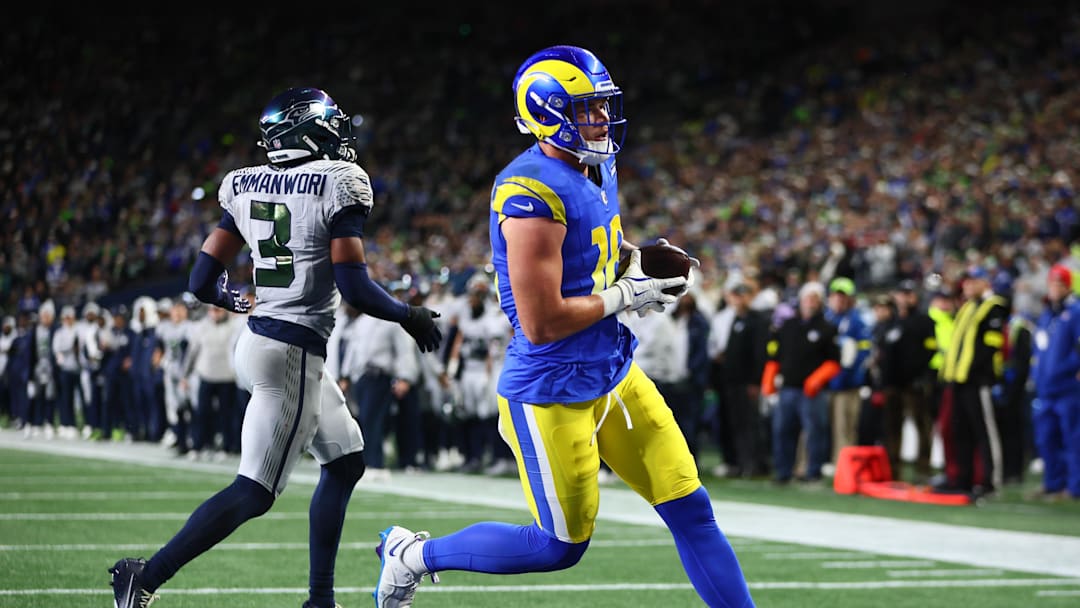 Dec 18, 2025; Seattle, Washington, USA; Los Angeles Rams tight end Terrance Ferguson (18) runs to score a touchdown against the Seattle Seahawks in the first half at Lumen Field. Mandatory Credit: Kevin Ng-Imagn Images