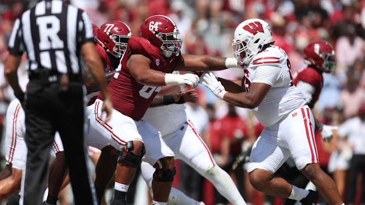 Michael Carroll (64) against Wisconsin. Michael Carroll (64) against Wisconsin.
