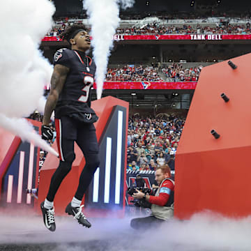 Dec 15, 2024; Houston Texans wide receiver Tank Dell (3) runs onto the field before the game against the Miami Dolphins at NRG Stadium. Mandatory Credit: Troy Taormina-Imagn Images