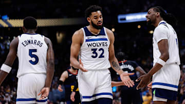 May 14, 2024; Denver, Colorado, USA; Minnesota Timberwolves center Karl-Anthony Towns (32) reacts with center Naz Reid (11) and guard Anthony Edwards (5) Mandatory Credit: Isaiah J. Downing-USA TODAY Sports