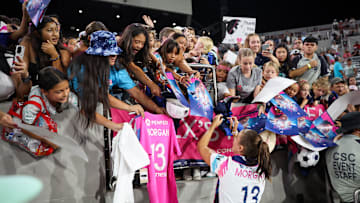 Alex Morgan with the fans at Snapdragon Stadium