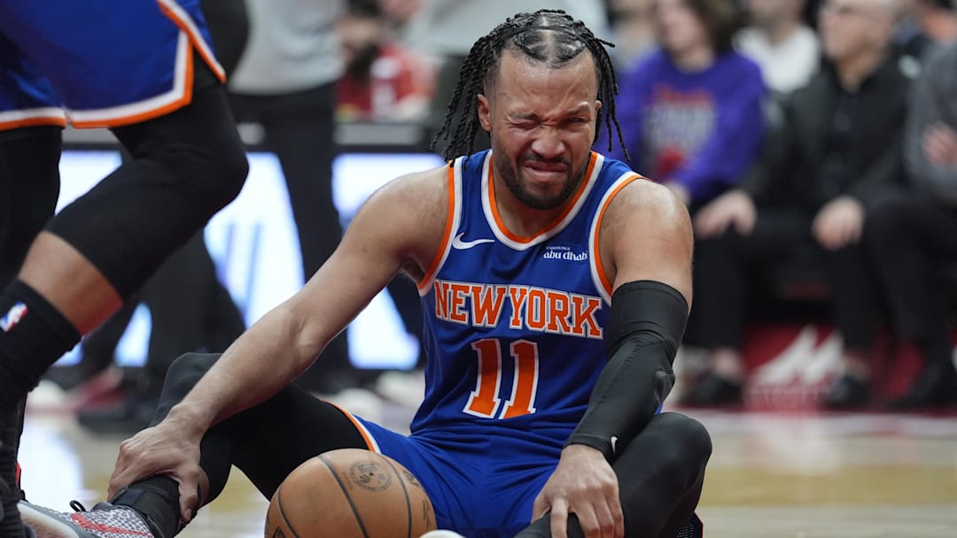 Mar 3, 2026; Toronto, Ontario, CAN; New York Knicks guard Jalen Brunson (11) reacts after getting poked in the eye during a collision with a Toronto Raptors player during the second half at Scotiabank Arena. Mandatory Credit: John E. Sokolowski-Imagn Images