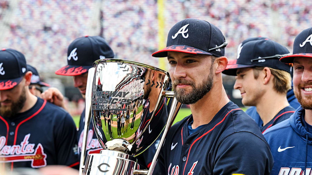 Aug 3, 2025; Bristol, Tennessee, USA; Atlanta Braves outfielder Eli White (36) holds the trophy after the win against Cincinnati Reds at Bristol Motor Speedway. Mandatory Credit: Bryan Lynn-Imagn Images Aug 3, 2025; Bristol, Tennessee, USA; Atlanta Braves outfielder Eli White (36) holds the trophy after the win against Cincinnati Reds at Bristol Motor Speedway. Mandatory Credit: Bryan Lynn-Imagn Images