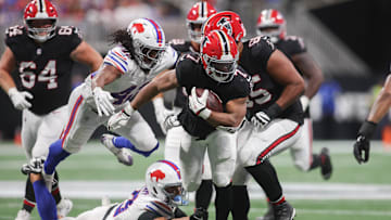 Oct 13, 2025; Atlanta, GA;  Atlanta Falcons running back Bijan Robinson carries the ball against the Buffalo Bills
