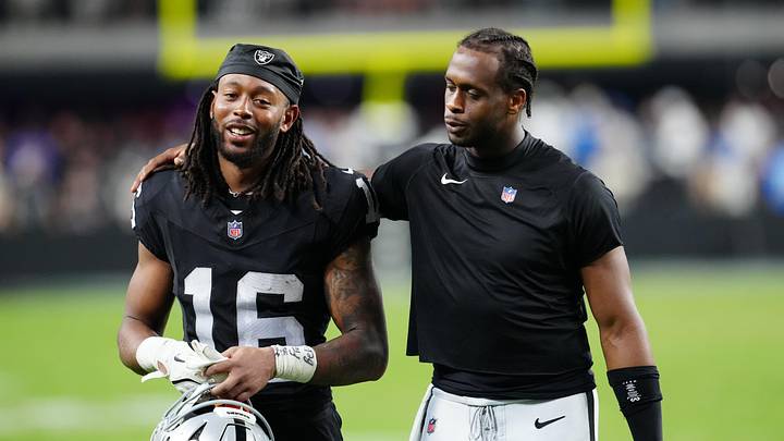 Sep 15, 2025; Paradise, Nevada, USA;  Las Vegas Raiders wide receiver Jakobi Meyers (16) and Las Vegas Raiders quarterback Geno Smith (7) walk off the field after the game at Allegiant Stadium. Mandatory Credit: Stephen R. Sylvanie-Imagn Images