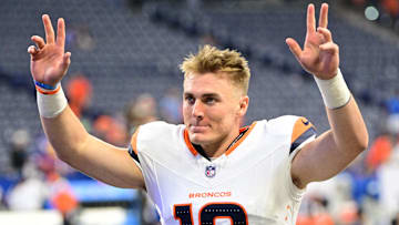 Aug 11, 2024; Indianapolis, Indiana, USA; Denver Broncos quarterback Bo Nix (10) waves to fans after the game against the Indianapolis Colts  at Lucas Oil Stadium. Mandatory Credit: Marc Lebryk-USA TODAY Sports