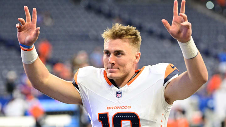 Aug 11, 2024; Indianapolis, Indiana, USA; Denver Broncos quarterback Bo Nix (10) waves to fans after the game against the Indianapolis Colts  at Lucas Oil Stadium. 