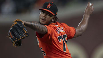 Sep 13, 2024; San Francisco, California, USA;  San Francisco Giants pitcher Camilo Doval (75) pitches during the eighth inning against the San Diego Padres at Oracle Park. Mandatory Credit: Stan Szeto-Imagn Images