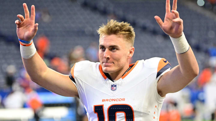 Aug 11, 2024; Indianapolis, Indiana, USA; Denver Broncos quarterback Bo Nix (10) waves to fans after the game against the Indianapolis Colts  at Lucas Oil Stadium. 