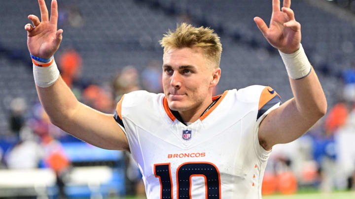 Aug 11, 2024; Indianapolis, Indiana, USA; Denver Broncos quarterback Bo Nix (10) waves to fans after the game against the Indianapolis Colts  at Lucas Oil Stadium.