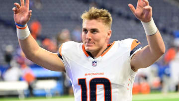 Aug 11, 2024; Indianapolis, Indiana, USA; Denver Broncos quarterback Bo Nix (10) waves to fans after the game against the Indianapolis Colts  at Lucas Oil Stadium. Mandatory Credit: Marc Lebryk-USA TODAY Sports