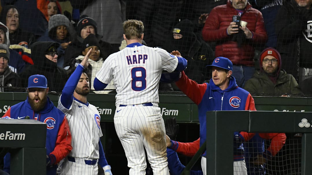 Apr 7, 2025; Chicago, Illinois, USA;  Chicago Cubs outfielder Ian Happ (8) celebrates with manager Craig Counsell (11), right, after he scores against the Texas Rangers during the sixth inning at Wrigley Field. Mandatory Credit: Matt Marton-Imagn Images