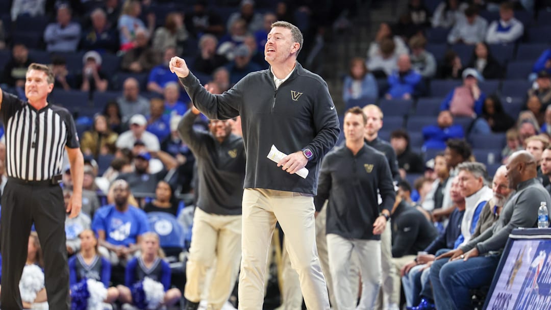 Dec 17, 2025; Memphis, Tennessee, USA; Vanderbilt Commodores head coach Mark Byington calls a play against the Memphis Tigers during the second half at FedExForum. Mandatory Credit: Wesley Hale-Imagn Images Dec 17, 2025; Memphis, Tennessee, USA; Vanderbilt Commodores head coach Mark Byington calls a play against the Memphis Tigers during the second half at FedExForum. Mandatory Credit: Wesley Hale-Imagn Images