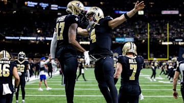 Derek Carr, A.T. Perry, New Orleans Saints
