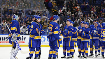Apr 6, 2025; Buffalo, New York, USA;  The Buffalo Sabres celebrate a win over the Boston Bruins at KeyBank Center. Mandatory Credit: Timothy T. Ludwig-Imagn Images