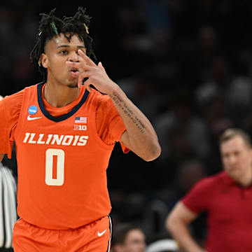 Mar 28, 2024; Boston, MA, USA; Illinois Fighting Illini guard Terrence Shannon Jr. (0) reacts after making a basket against the Iowa State Cyclones in the semifinals of the East Regional of the 2024 NCAA Tournament at TD Garden. Mandatory Credit: Brian Fluharty-Imagn Images