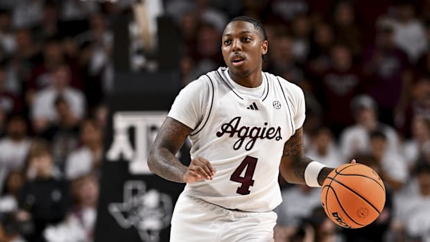 Nov 8, 2024; College Station, Texas, USA; Texas A&M Aggies guard Wade Taylor IV (4) dribbles the ball during the first ha