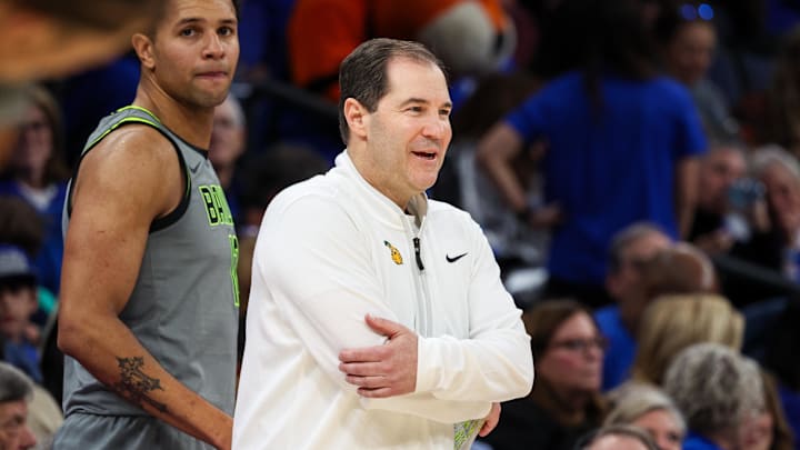 Dec 6, 2025; Memphis, Tennessee, USA; Baylor Bears head coach Scott Drew reacts against the Memphis Tigers during the first half at FedExForum. Mandatory Credit: Wesley Hale-Imagn Images