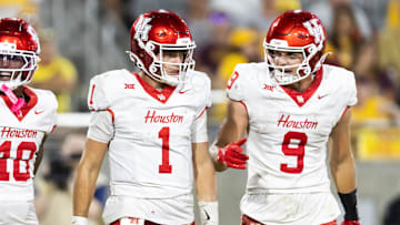 Houston Cougars quarterback Conner Weigman (1) and tight end Tanner Koziol (9) against the Arizona State Sun Devils at Mountain America Stadium.