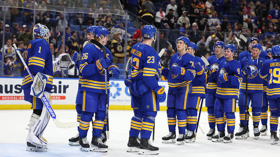 Apr 6, 2025; Buffalo, New York, USA;  The Buffalo Sabres celebrate a win over the Boston Bruins at KeyBank Center. Mandatory Credit: Timothy T. Ludwig-Imagn Images