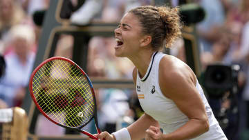 Jasmine Paolini of Italy celebrates winning her match.