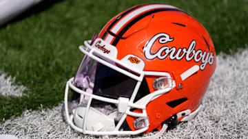 An Oklahoma State helmet is pictured before a college football game between the Oklahoma State Cowboys (OSU) and the West Virginia Mountaineers at Boone Pickens Stadium in Stillwater, Okla., Saturday, Oct. 5, 2024.