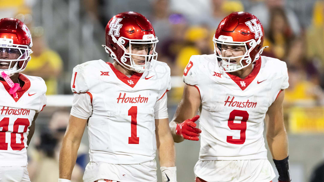 Oct 25, 2025; Tempe, Arizona, USA; Houston Cougars quarterback Conner Weigman (1) and tight end Tanner Koziol (9) against the Arizona State Sun Devils at Mountain America Stadium. Mandatory Credit: Mark J. Rebilas-Imagn Images Oct 25, 2025; Tempe, Arizona, USA; Houston Cougars quarterback Conner Weigman (1) and tight end Tanner Koziol (9) against the Arizona State Sun Devils at Mountain America Stadium. Mandatory Credit: Mark J. Rebilas-Imagn Images