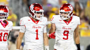 Oct 25, 2025; Tempe, Arizona, USA; Houston Cougars quarterback Conner Weigman (1) and tight end Tanner Koziol (9) against the Arizona State Sun Devils at Mountain America Stadium. Mandatory Credit: Mark J. Rebilas-Imagn Images