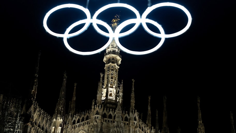 The Olympic rings are seen in front of the Duomo di Milano in preparation for the Milano Cortina 2026 Olympics
