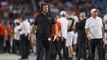 Sep 14, 2023; Miami Gardens, Florida, USA; Miami Hurricanes offensive coordinator Shannon Dawson looks on from the sideline against the Bethune Cookman Wildcats during the second quarter at Hard Rock Stadium. Mandatory Credit: Sam Navarro-Imagn Images