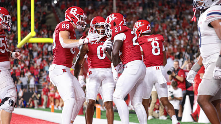 Aug 29, 2024; Piscataway, New Jersey, USA;  Rutgers Scarlet Knights running back Samuel Brown V (27) celebrates his touchdown.