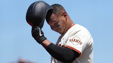 Jul 12, 2025; San Francisco, California, USA; San Francisco Giants designated hitter Rafael Devers (16) walks to the dugout after grounding out against the Los Angeles Dodgers during the sixth inning at Oracle Park